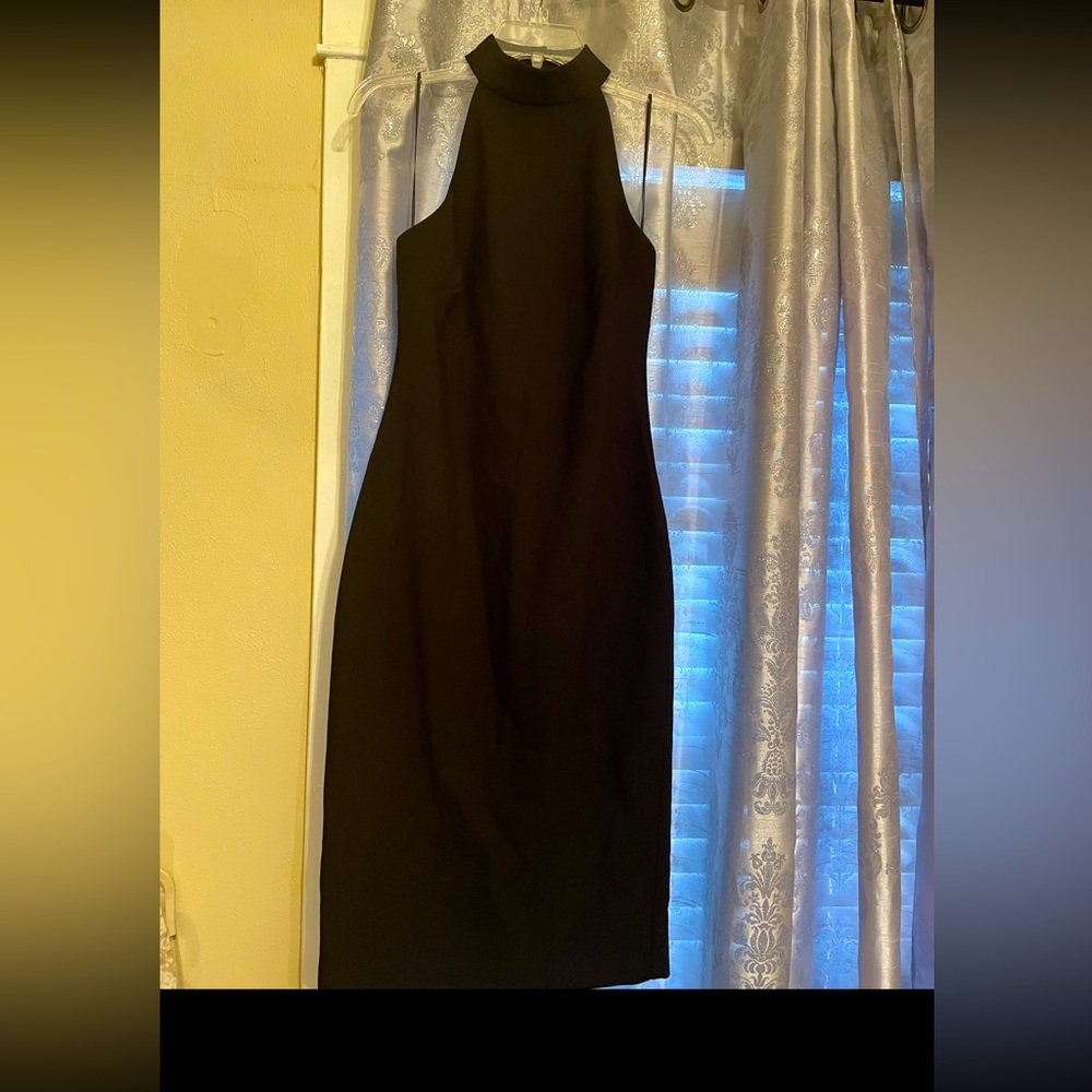 Likely black dress size 8